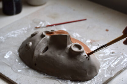 Maskers maken van klei